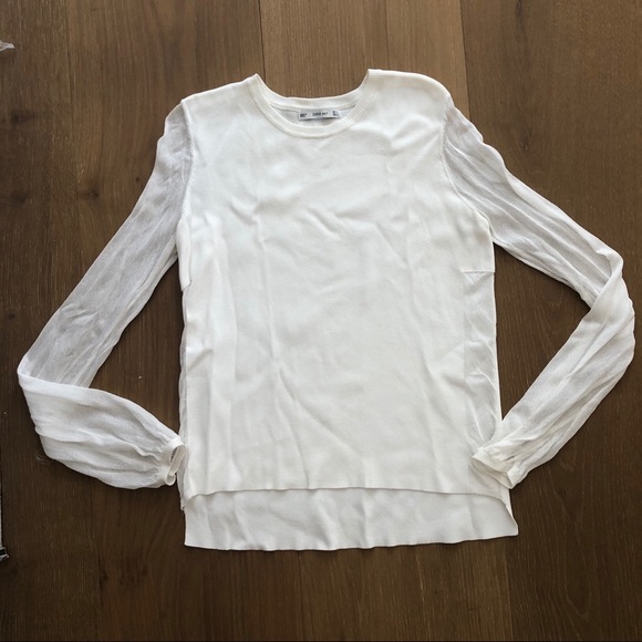 white top with sheer sleeves